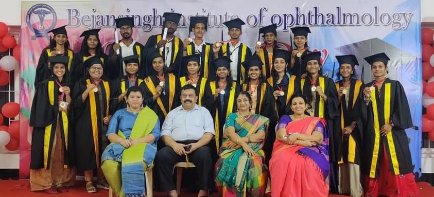 Graduating optometry students receiving their degrees